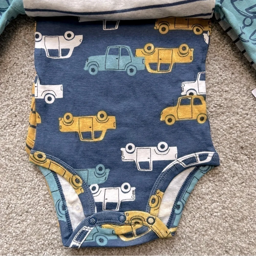 NWT Carter’s baby size 9 months four pc. Long sleeve onesies